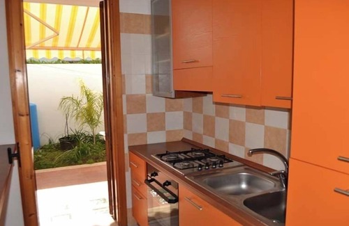 Torre dell'Orso Apartment | Charming Holiday Apartment "Casa a Torre dell'Orso PT55" with Garden