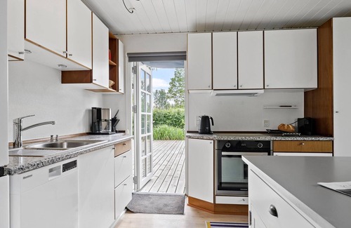 Hejsager Strand House | Unwind in a Beautiful House with Inviting Garden & Ocean View