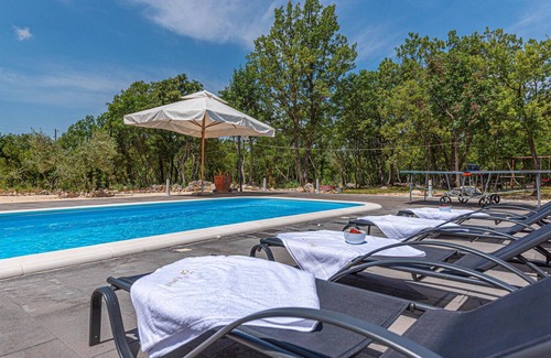 Oklaj House | Entertainment Oasis with Pool, Spa & Family-Friendly Fun
