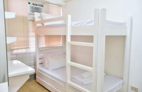 Quezon City Apartment | Modern 2BR Condo with Pool Access & Netflix in San Juan