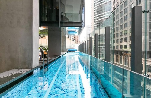 Sydney Central Business District Apartment | Stylish One Bedroom + Study with Infinity Pool Retreat