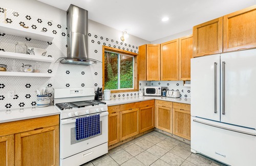 Alki House | Inviting Home with Ocean Views, Scenic Deck & Cozy Fireplaces