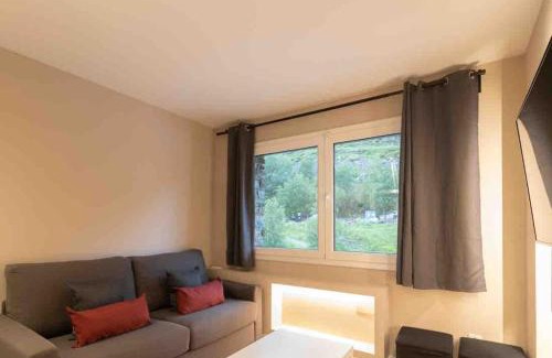 Soldeu Apartment | Serene Apartment Steps from Ski Runs, Rated 9/10