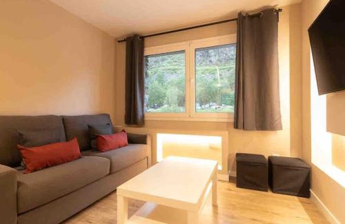 Soldeu Apartment | Serene Apartment Steps from Ski Runs, Rated 9/10