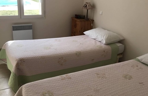 Coex Villa | Inviting Villa with Private Heated Pool - Sleeps 9, Rated 9.8