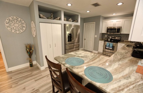 Bay Crest Park House | Experience Relaxation: 4BR Home with Heated Pool & Spa