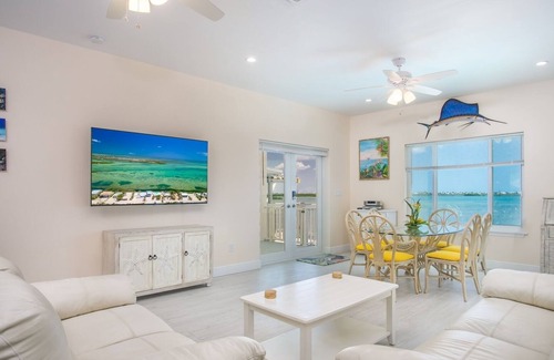 Breezeswept Beach Estates House | Low Key Sunrise: Waterfront pool home