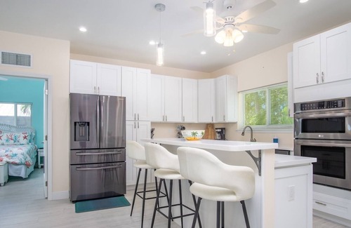 Breezeswept Beach Estates House | Low Key Sunrise: Waterfront pool home