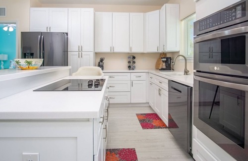 Breezeswept Beach Estates House | Low Key Sunrise: Waterfront pool home
