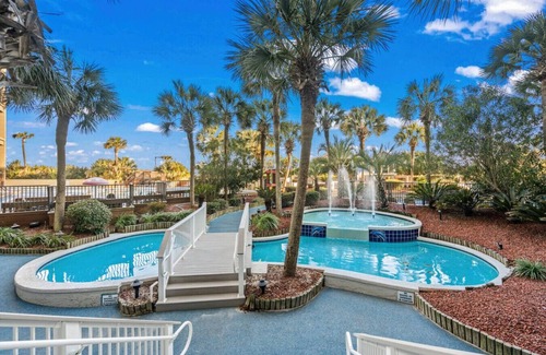 Windy Hill Condo | Low Tide | Oceanfront Balcony | Kitchen | Pools
