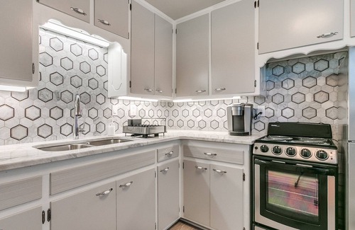 Norman House | Lower Level Campus Property Right Next To The Stadium!