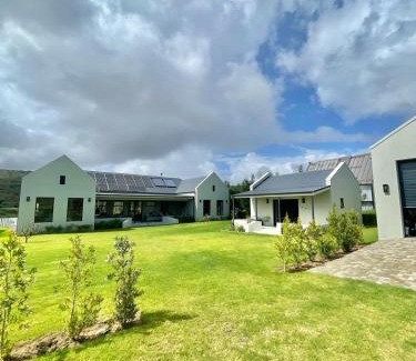 Malagas House | Discover Kalm Riverside Living - Family-Friendly Getaway
