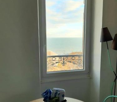 Luc-sur-Mer Apartment | Cozy LUC and SEA: Oceanfront Retreat with Breakfast Included
