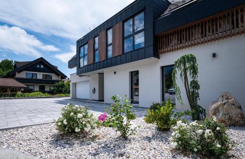 Zasip Apartment | Serene Stay at LUCKA BLED: Bikes, Garden & Family Fun