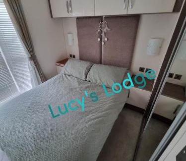 Rhyl House | Discover Lucy's Lodge: Top-Rated Stay with Private Pool