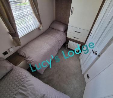 Rhyl House | Discover Lucy's Lodge: Top-Rated Stay with Private Pool