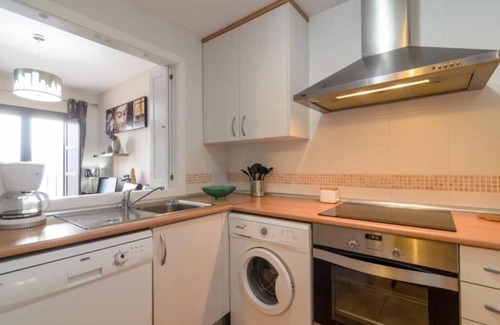 Velez de Benaudalla Apartment | Elegant Apartment with Pools, Free Parking & Internet Access