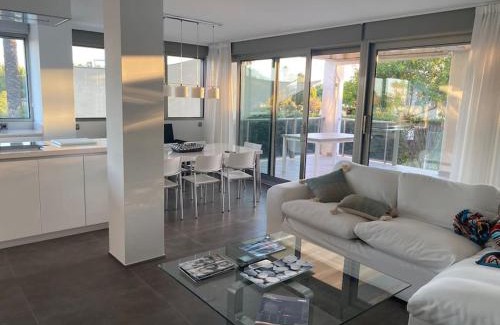 Denia Apartment | Elegant Apartment Steps from the Ocean with Pool Access