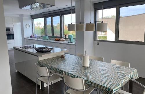 Denia Apartment | Elegant Apartment Steps from the Ocean with Pool Access