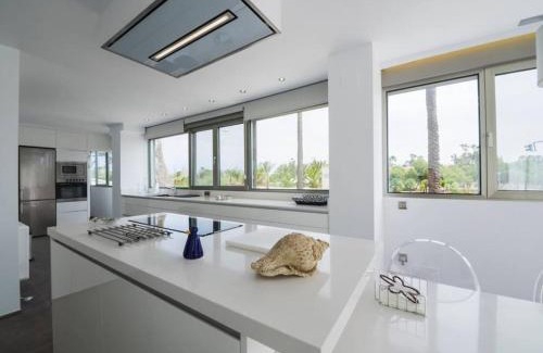 Denia Apartment | Elegant Apartment Steps from the Ocean with Pool Access