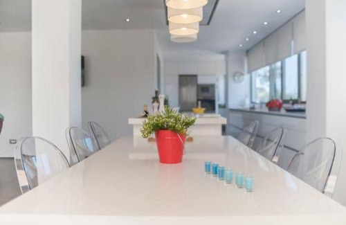 Denia Apartment | Elegant Apartment Steps from the Ocean with Pool Access