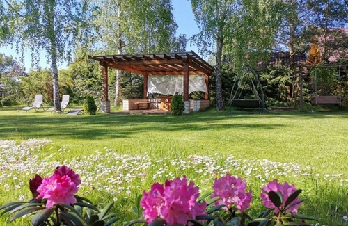 Januszkowo Villa | Elegant Villa with Garden, Terrace & Lake Views Near Mielno