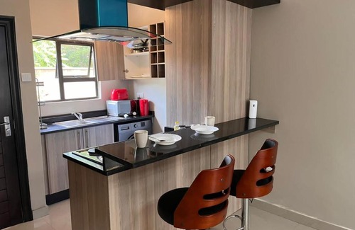 Lusaka Apartment | Discover Lukundo Place: Rated 9/10 with Kitchen Access
