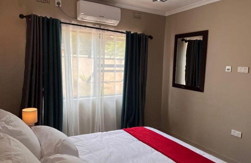 Lusaka Apartment | Discover Lukundo Place: Rated 9/10 with Kitchen Access