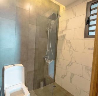 Angre Apartment | Welcoming Lumina Suites: Child-Friendly with Breakfast Option