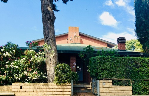 Piombino House | Serene Retreat Steps from a Beautiful Beach with Pool