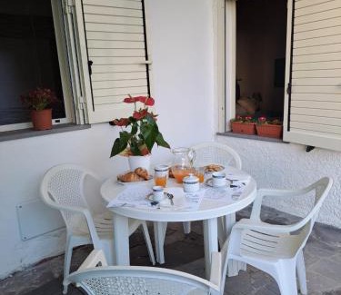 S'Archittu Apartment | Oceanfront Escape at Lungomare Chess - 4-Star Comfort