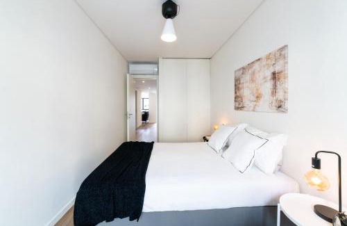 Santo Amaro Apartment | Inviting Lusíadas 53 2ºD - Cozy Two-Bedroom Retreat