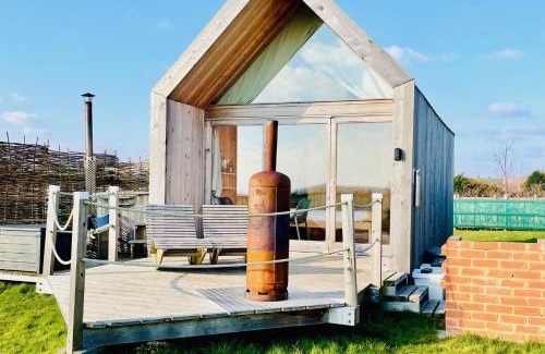 Brightlingsea House | Experience Lushna 12 Lux at Lee Wick Farm Cottages
