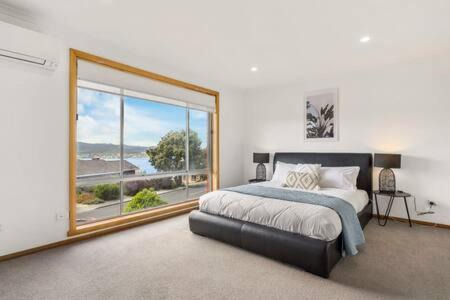 Lutana House | Family-Friendly Retreat at Lutana Large House, 4-Star Stay