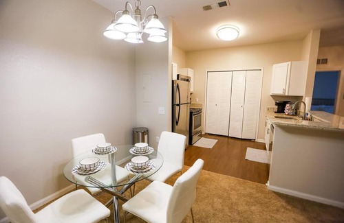 Ferry Pass Apartment | Modern 2BD Retreat with Pool, Steps from the Shore