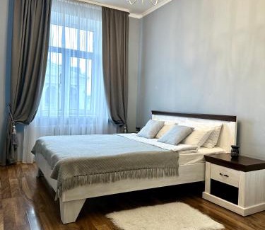 Rivne Apartment | Stylish City Center Apartments with Theater Views & Breakfast
