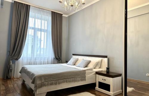 Rivne Apartment | Stylish City Center Apartments with Theater Views & Breakfast