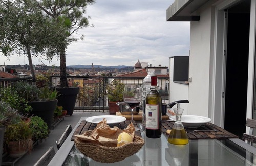 Santissima Annunziata House | Stylish Attic Retreat with Terrace and City Views