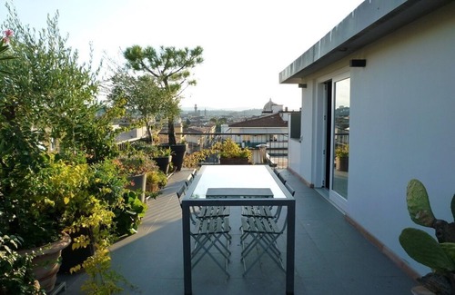 Santissima Annunziata House | Stylish Attic Retreat with Terrace and City Views