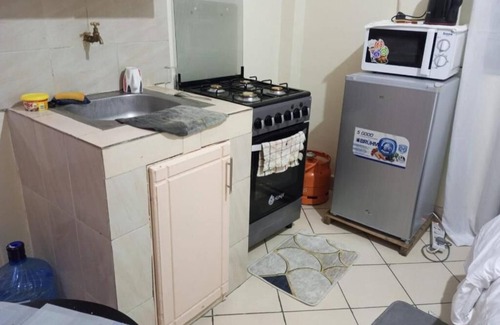 Mbotela Apartment | Cozy Suites at Attic Place: Studio Apartments with Kitchen