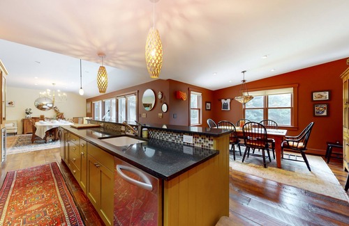 Warren House | Elegant Retreat with Hot Tub, Game Room & Beautiful Garden