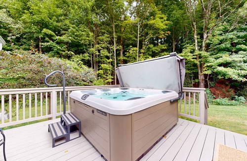 Warren House | Elegant Retreat with Hot Tub, Game Room & Beautiful Garden