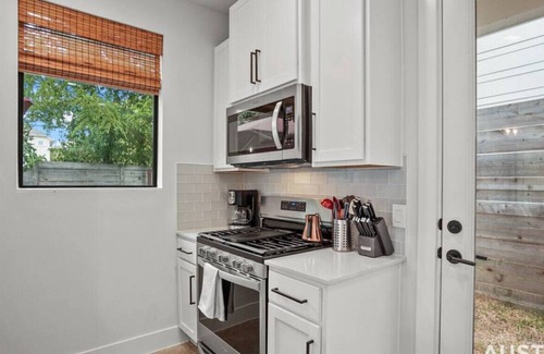Rosewood House | Luxe King Primary + Comfort and Cool Shaded Patio