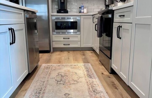 Monticello House | Elegant Lake Barndo: 2 King Suites & Hot Tub Await You