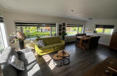 Poppel Ski Chalet | Tranquil Forest Retreat with Private Beach & Pool