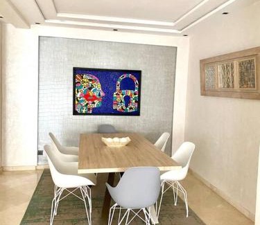 Racine Apartment | Elegant Triangle D’or Apartment with Family-Friendly Amenities
