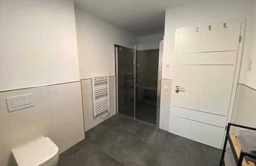 Echternacherbruck Apartment | Riverside Retreat with Infrared Sauna and Family-Friendly Perks