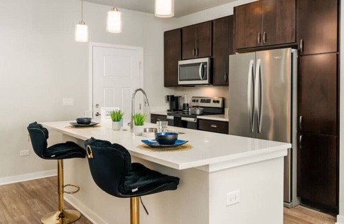 Plato Center Apartment | Modern 2-Bedroom Retreat with Pool & Kitchen Access