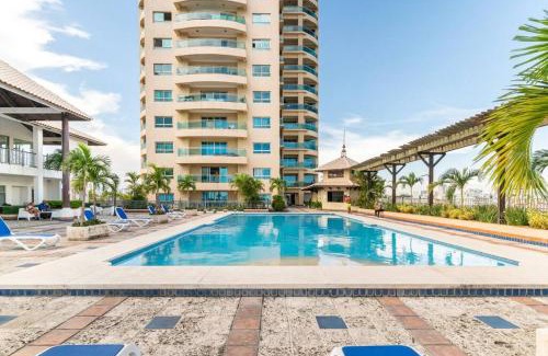 San Geronimo Apartment | Elegant 2BDR Condo in Prestigious Tower with Pool & Breakfast