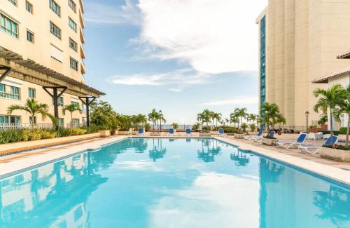 San Geronimo Apartment | Elegant 2BDR Condo in Prestigious Tower with Pool & Breakfast